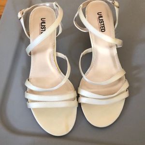 “Unlisted” sandals with kitten heels